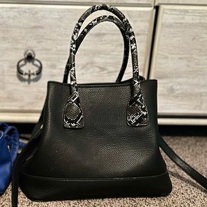 Black handbag/crossbody with snake skin handle